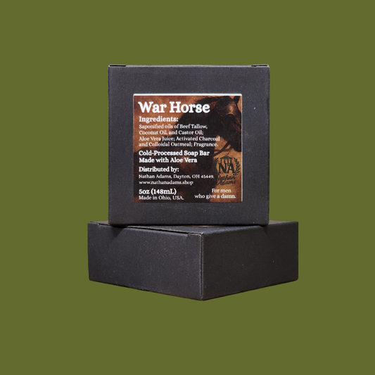 Cold-process charcoal bar soap for men.